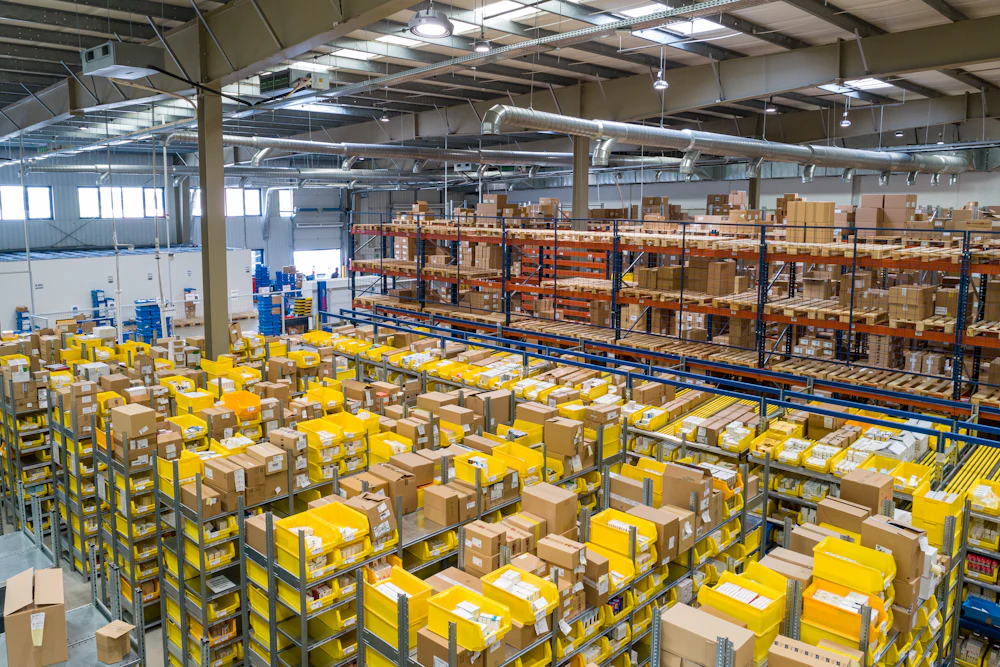 Warehouse staff inspecting parcels